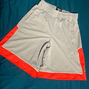 Men’s small under armor shorts. Smoke free home. Light gray and red